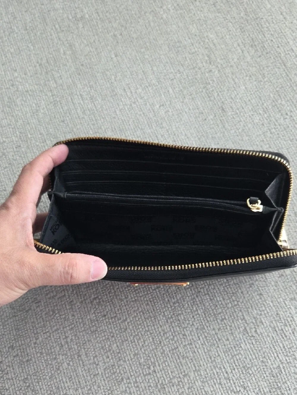 Michael Kors Black Leather Zip-Around Wallet with Gold Plaque